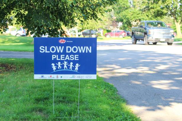 CAA Slow Down Signs